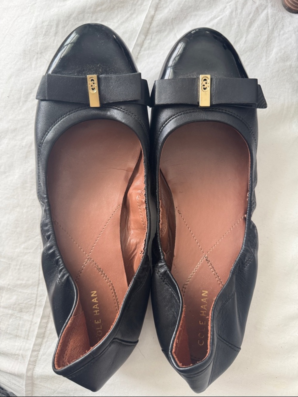 Cole Haan Black Leather Ballet Flats with Bow and Gold Accent